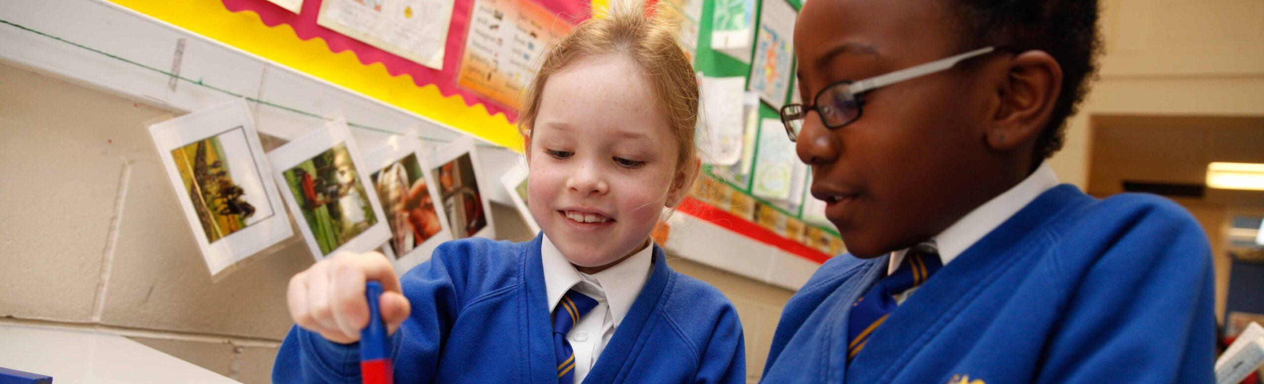 A pupil enjoying a classroom learning activity